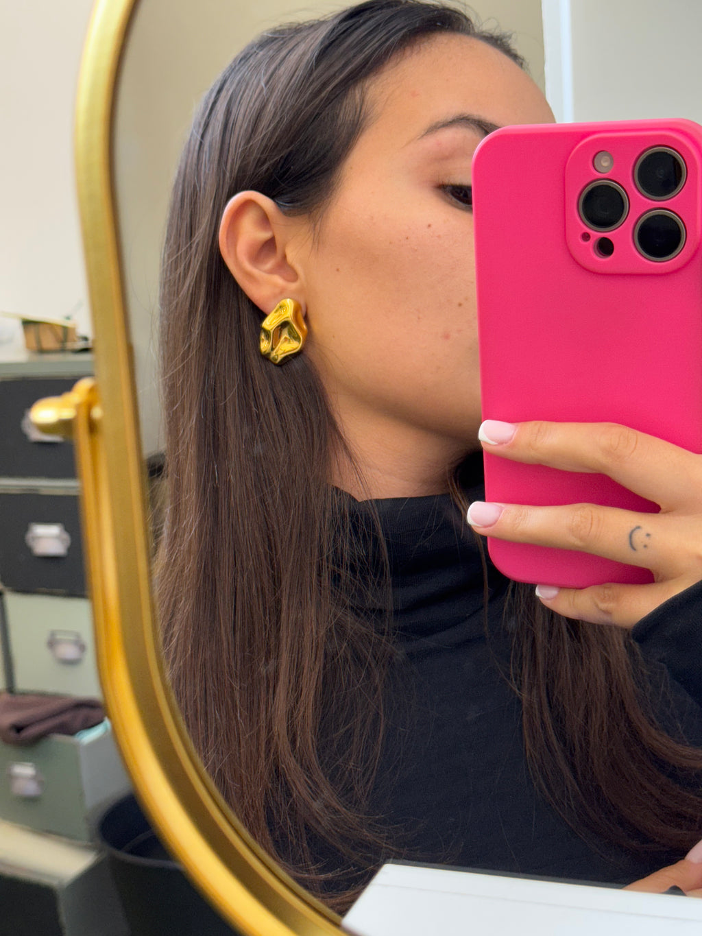 Thais gold earrings