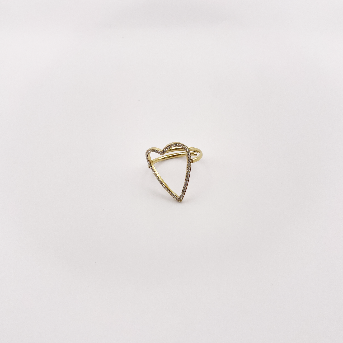 Anello cuore vuoto con strass oro